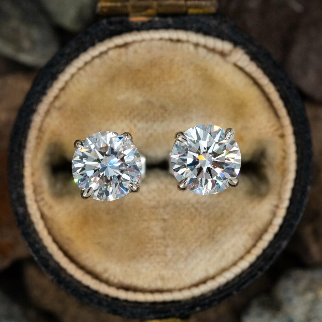 custom earring studs on the brown background